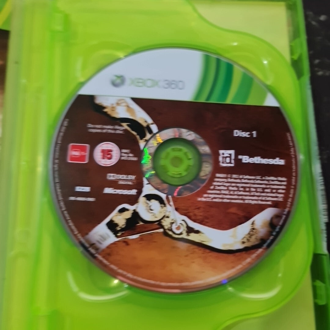 6998027